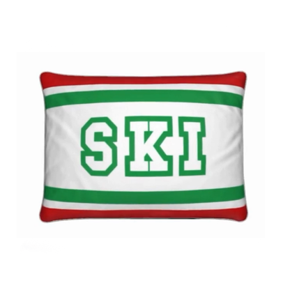 Coussin Chalet rouge, blanc et vert sur le thème du ski italien 