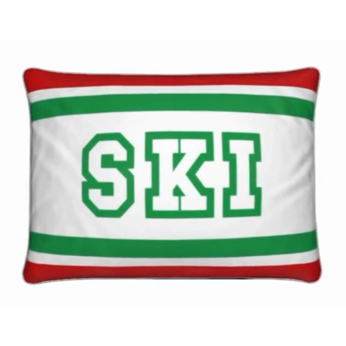 Coussin Chalet rouge, blanc et vert sur le thème du ski italien 