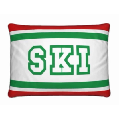 Coussin Chalet rouge, blanc et vert sur le thème du ski italien 