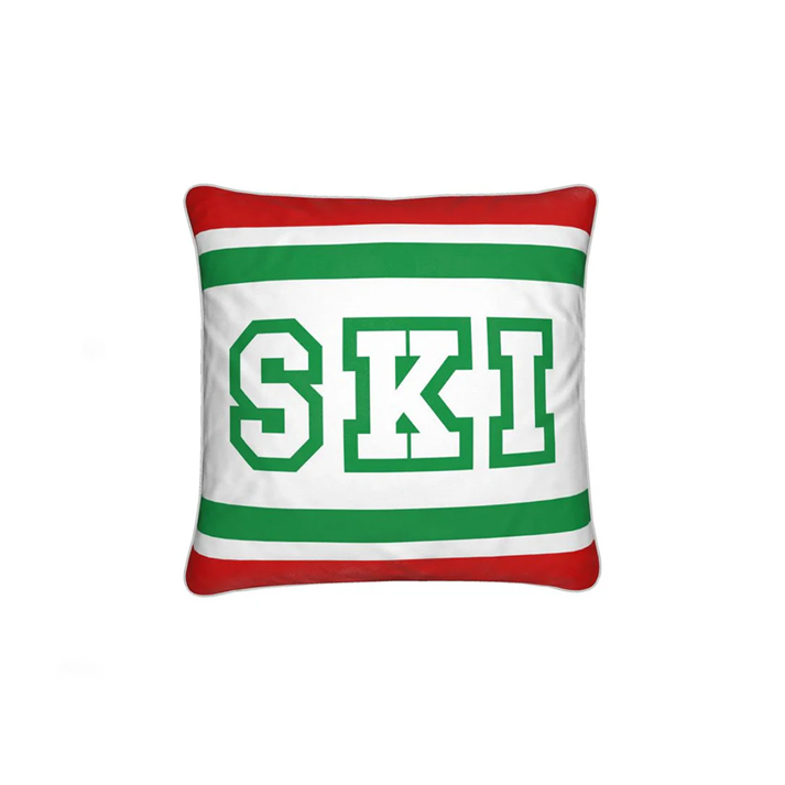 Coussin Chalet rouge, blanc et vert sur le thème du ski italien 