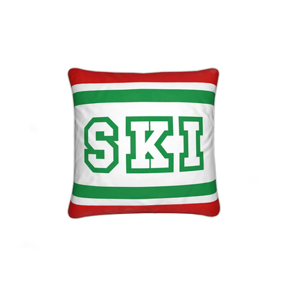 Coussin Chalet rouge, blanc et vert sur le thème du ski italien 