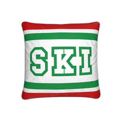 Coussin Chalet rouge, blanc et vert sur le thème du ski italien 