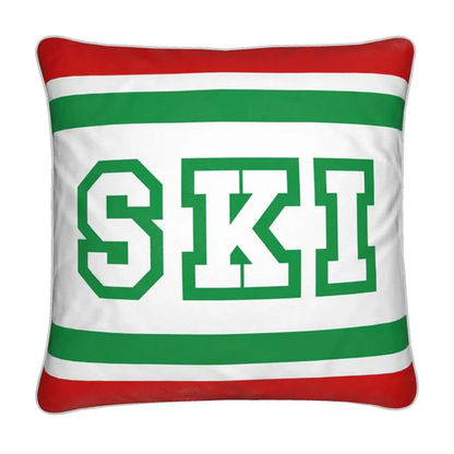 Coussin Chalet rouge, blanc et vert sur le thème du ski italien 