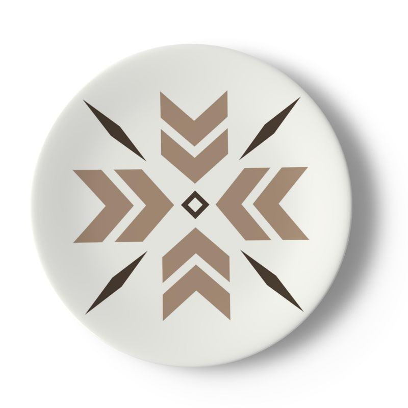 white plate with beige and brown snowflake