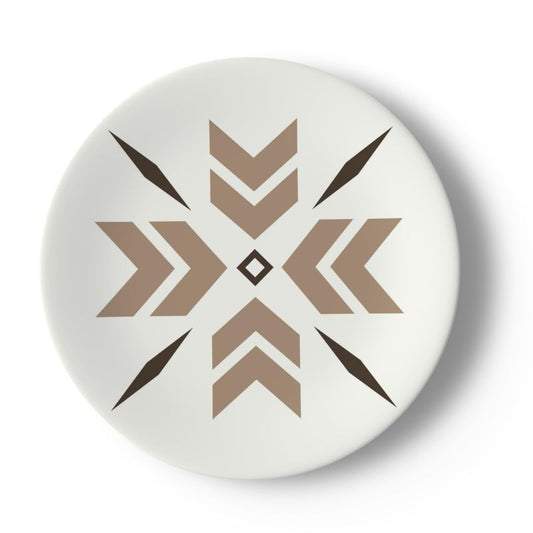 white plate with beige and brown snowflake