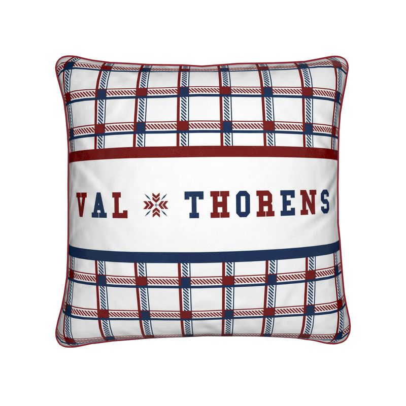 red white and blue check cushion with Val Thorens written along the middle