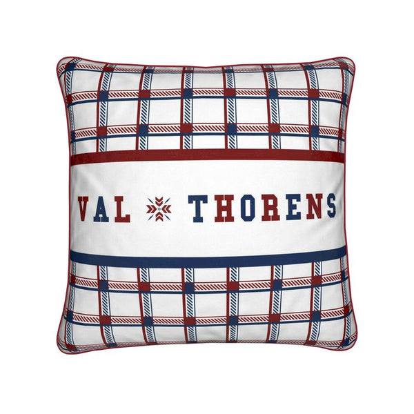 red white and blue check cushion with Val Thorens written along the middle