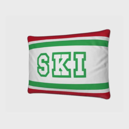 Coussin Chalet rouge, blanc et vert sur le thème du ski italien 
