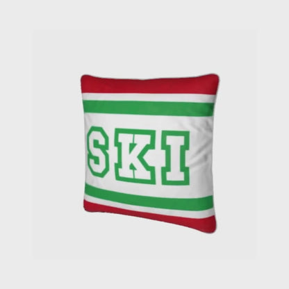 Coussin Chalet rouge, blanc et vert sur le thème du ski italien 