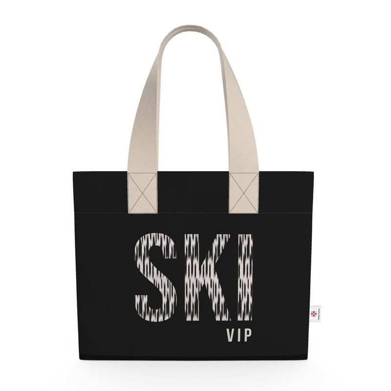 Black shopping tote with SKI VIP written on the front in mottled beige.