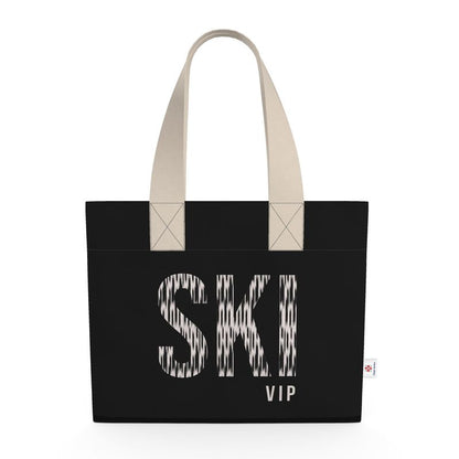 Black shopping tote with SKI VIP written on the front in mottled beige.
