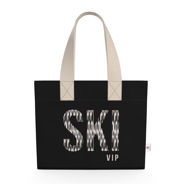 Black shopping tote with SKI VIP written on the front in mottled beige.
